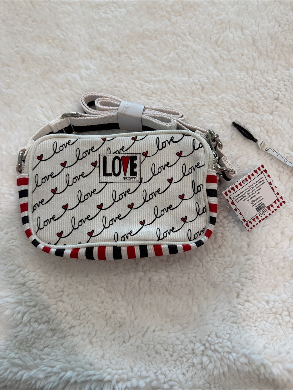 Love Graphic Crossbody Bag in White by 
Brighton